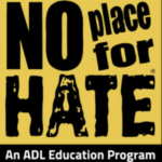 Yellow sign with black letters that says No Place for Hate An ADL Education Program