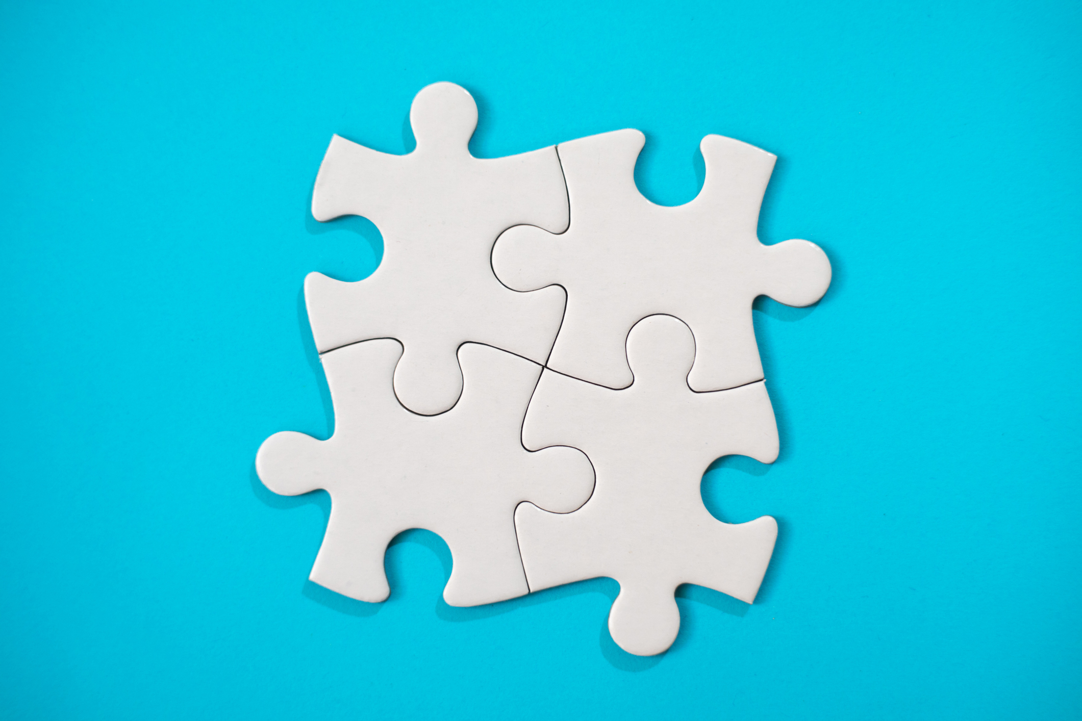 White jigsaw puzzle connecting together
